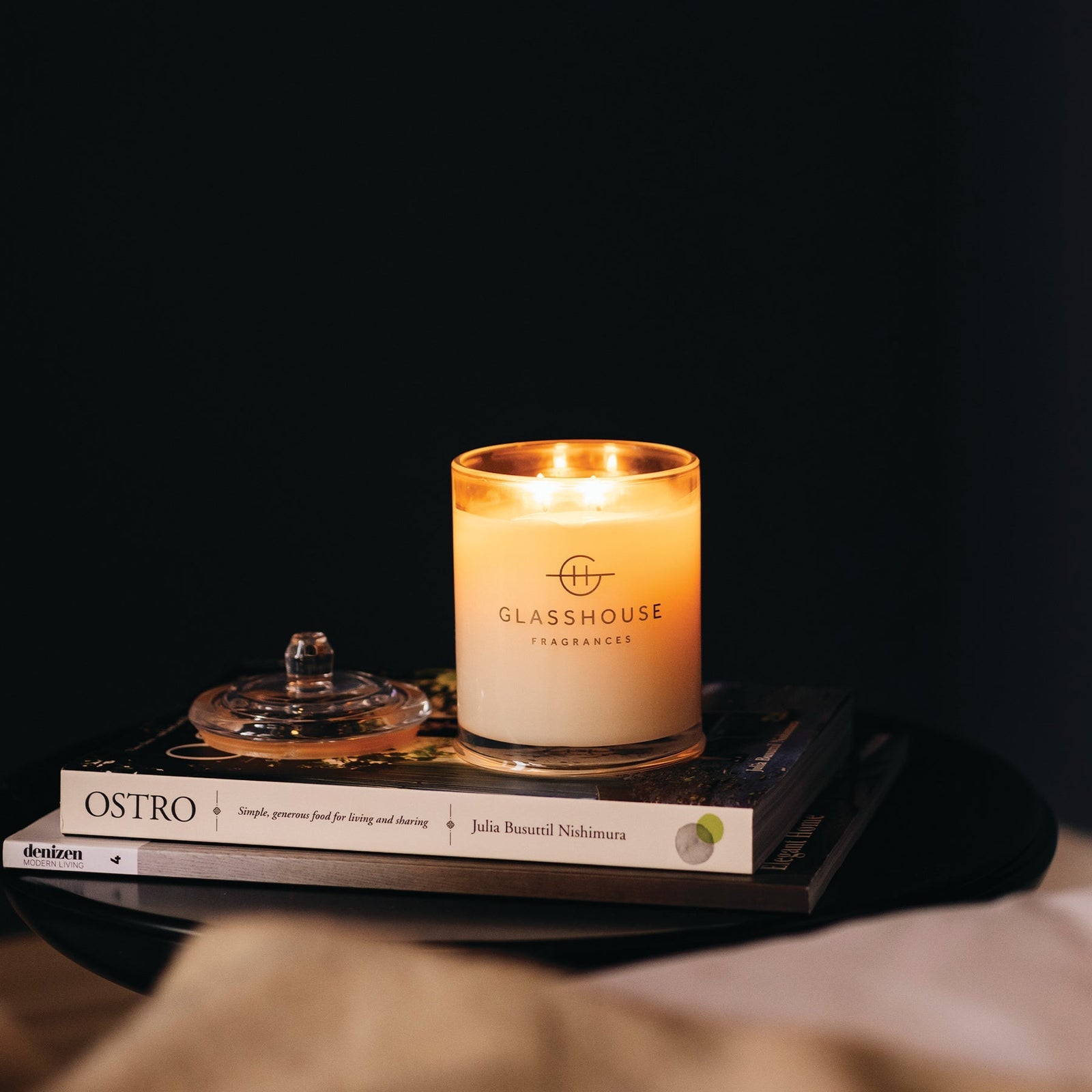 Glasshouse Midnight in Milan scented candle styled in a home
