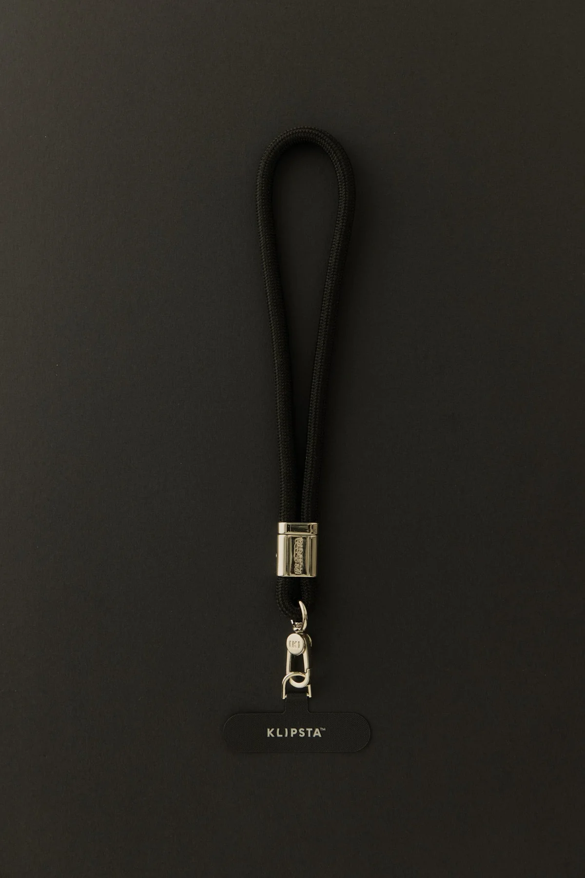 KLIPSTA - LOOP PHONE WRIST STRAP | SILVER + BLACK