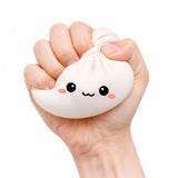 Squeezing a Lucky Bao squishy