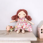Alimrose Mini Matilda doll in a child's room